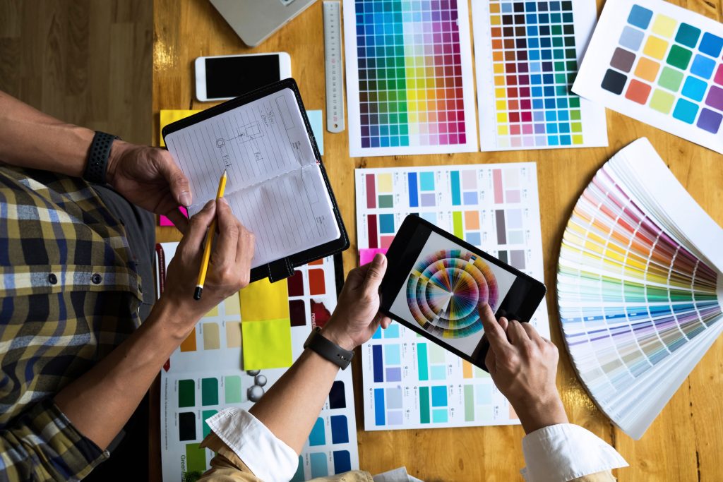 Designers look at colour charts